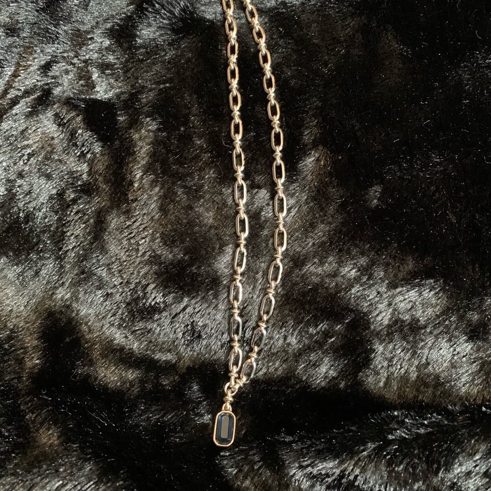 18” silver with sapphire  (I believe it’s costume item but there’s no tarnish )